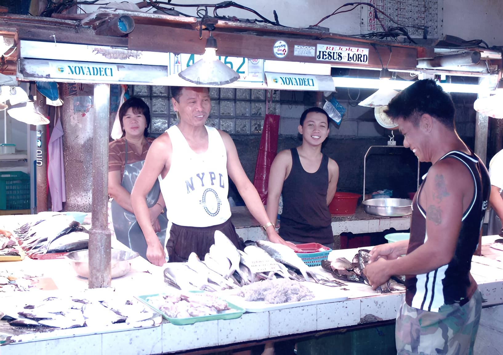 Early NOVADECI members at a Novaliches market fish stall