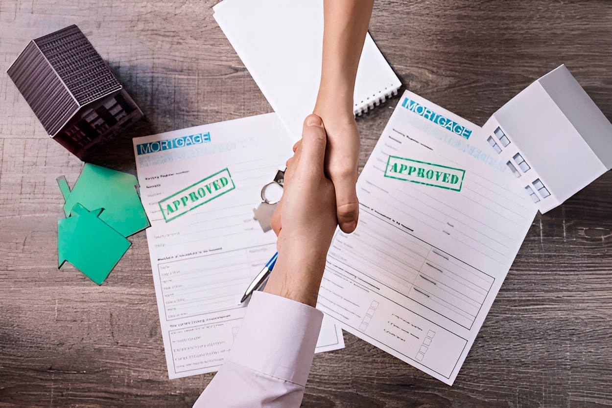 Mortgage documents stamped approved with a handshake, representing NOVADECI collateralized loans
