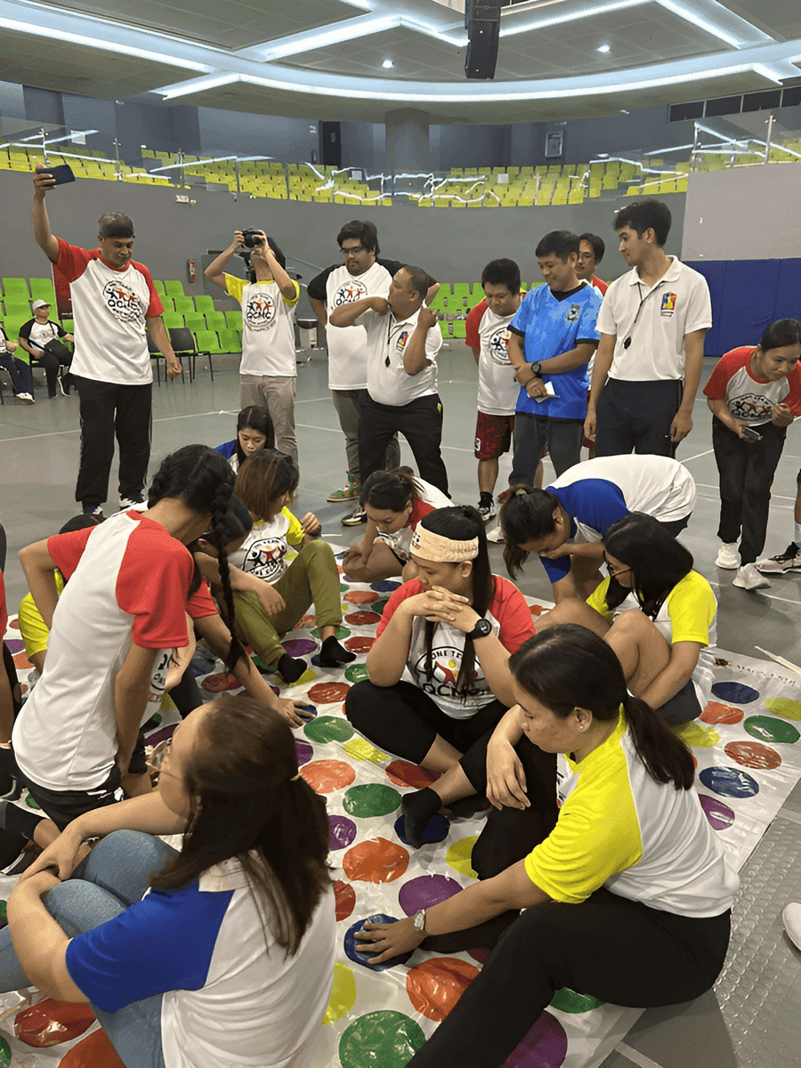 Team building sports activity in an indoor court