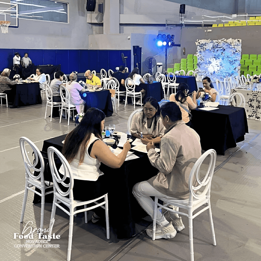 Guests posing at a grand food tasting event