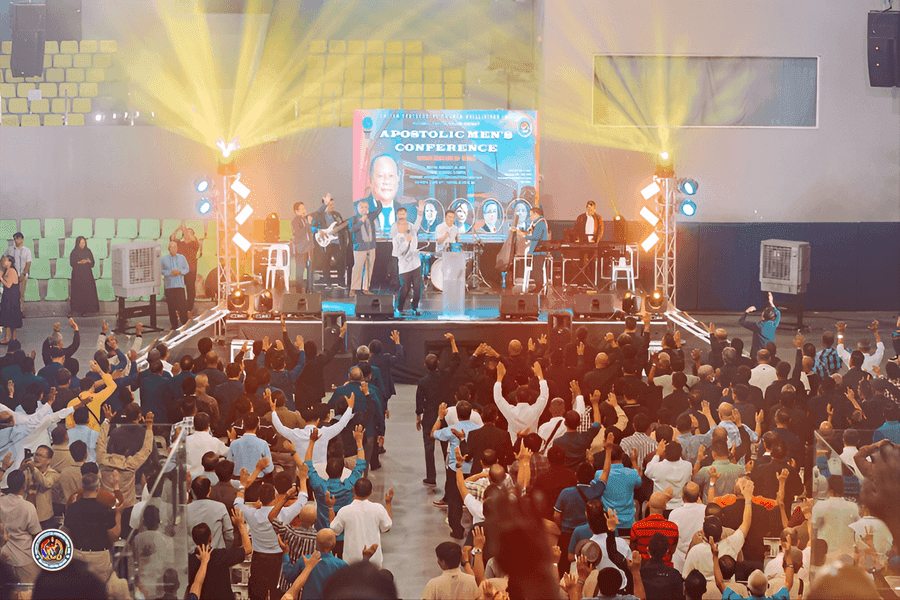 Large audience seated for a religious gathering